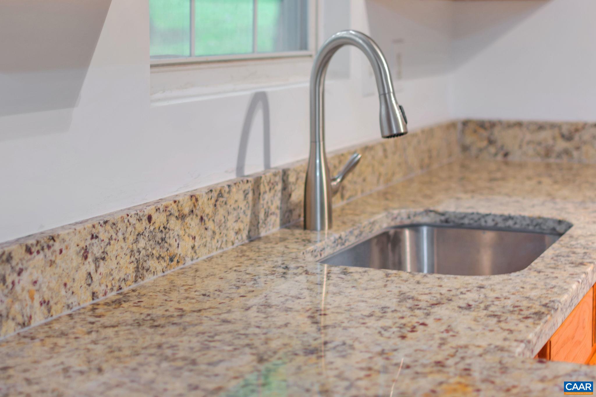 14 Hatchechubee Road Palmyra, VA 22963 - Photo 10 of 30 a view of water heater room with a sink
