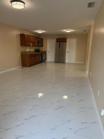 a view of kitchen and stove