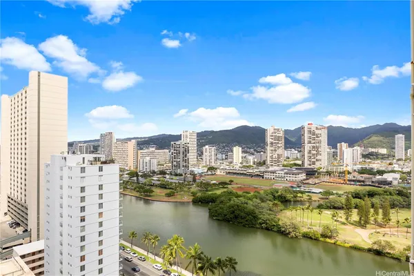 a view of a city with tall buildings