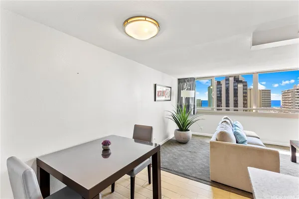 a living room with furniture and a window