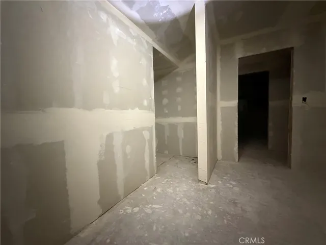 a view of a room with a fireplace