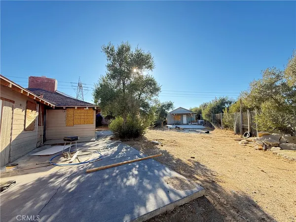 a view of a yard with an outdoor space