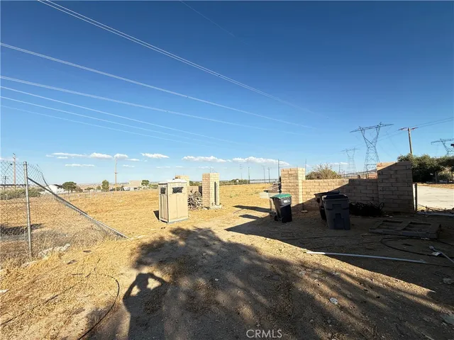a view of a yard with an outdoor space