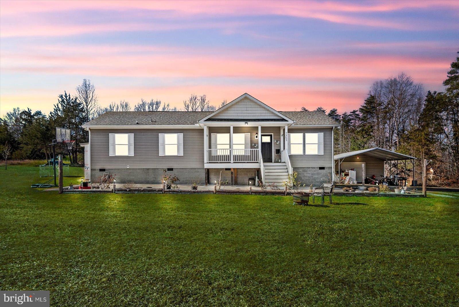 6600 Stubbs Bridge Road Spotsylvania, VA 22551 - Photo 1 of 37 Charming home with serene sunset backdrop.