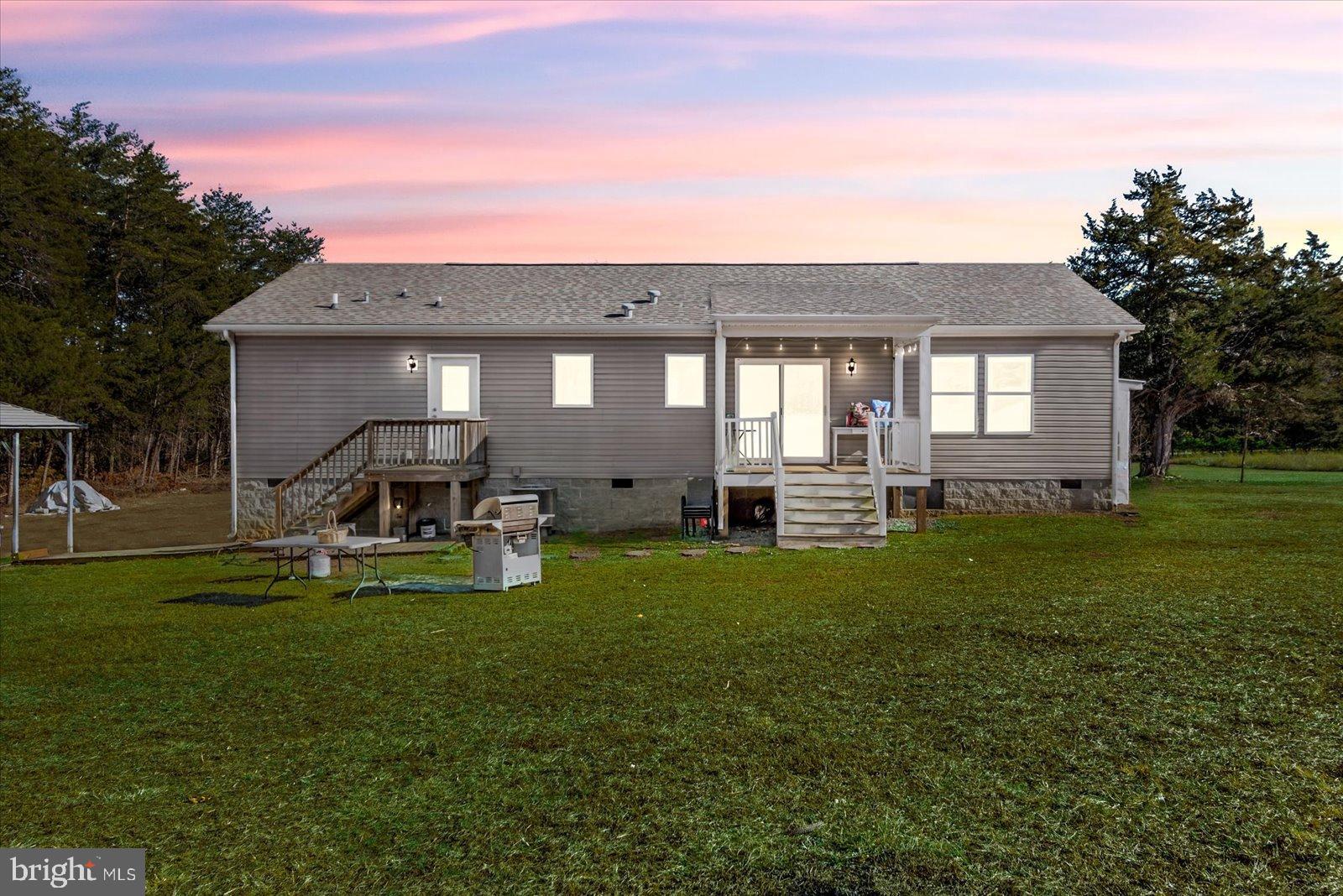 6600 Stubbs Bridge Road Spotsylvania, VA 22551 - Photo 27 of 37 Charming home with serene sunset backdrop.