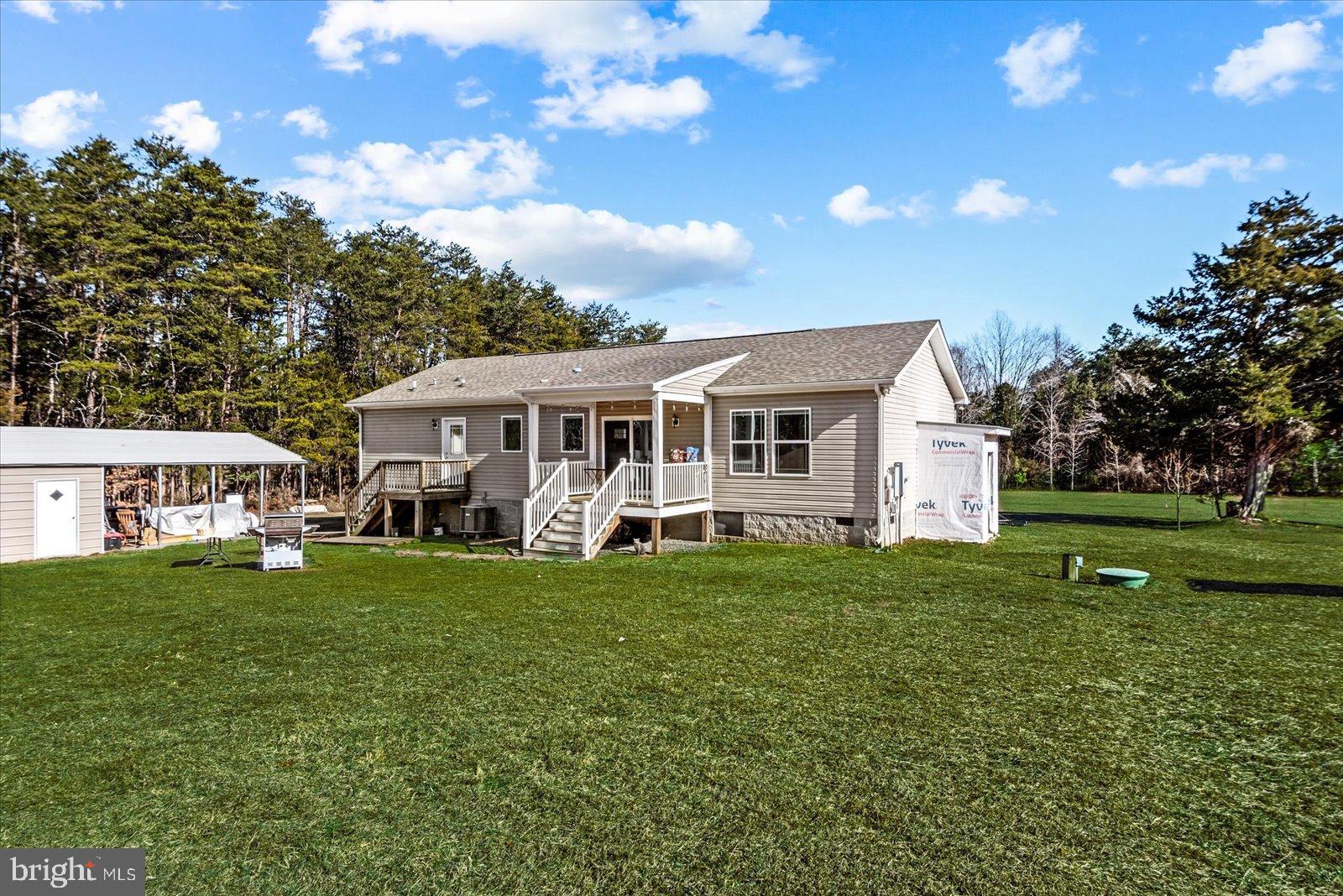 6600 Stubbs Bridge Road Spotsylvania, VA 22551 - Photo 29 of 37 Charming home nestled in lush greenery.