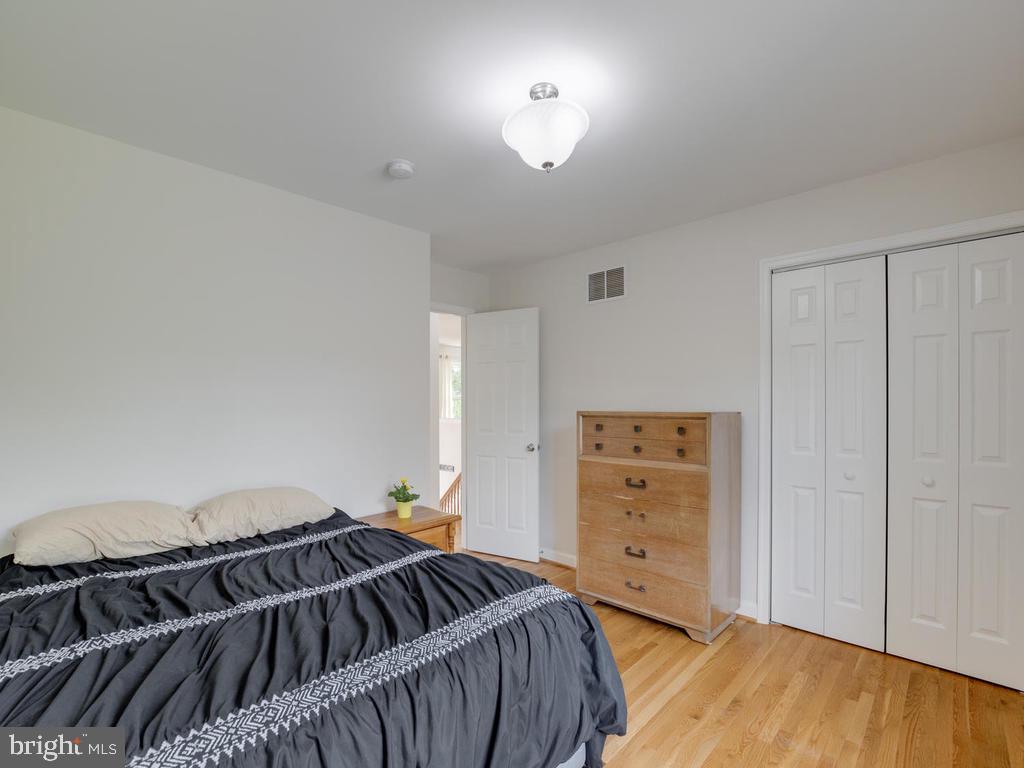 976 Pebblestone Road Pasadena, MD 21122 - Photo 15 of 39 Spacious bedroom with wood floors