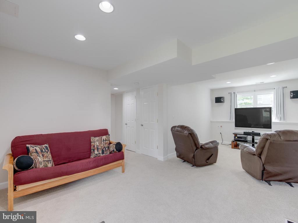 976 Pebblestone Road Pasadena, MD 21122 - Photo 22 of 39 Family room in lower level