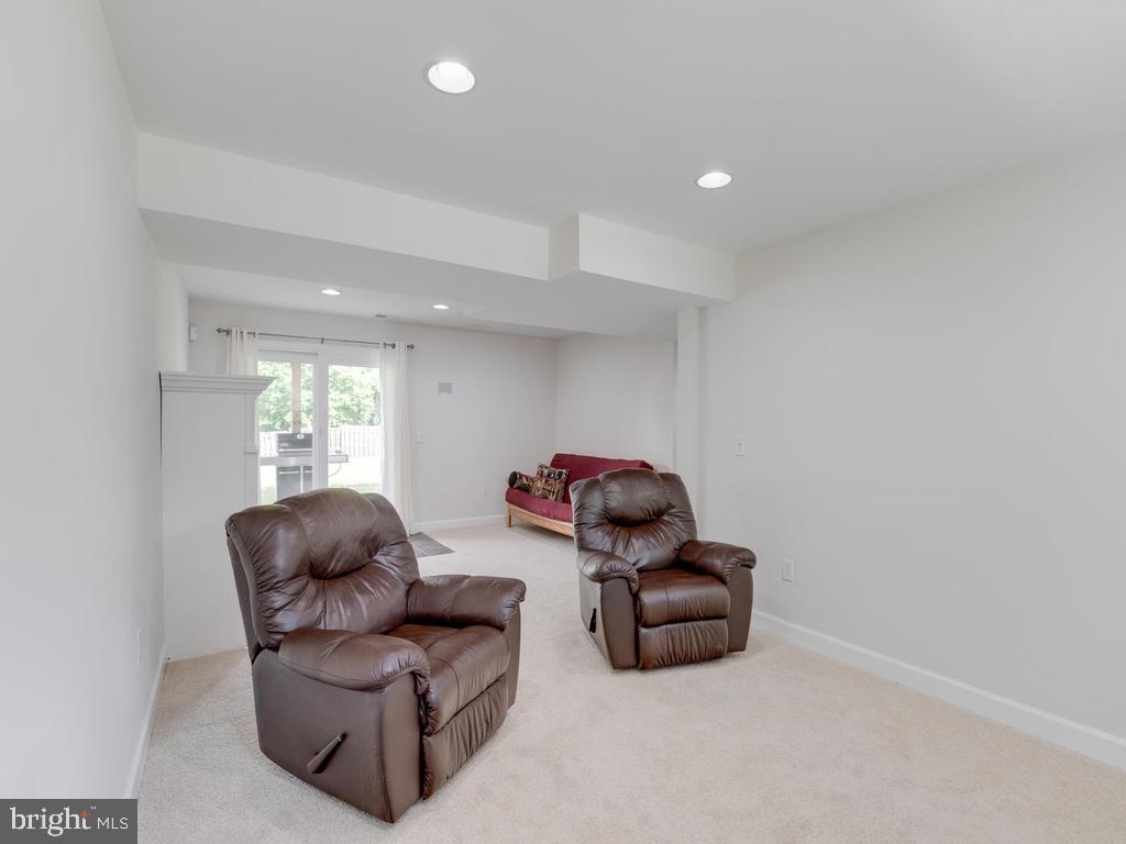 976 Pebblestone Road Pasadena, MD 21122 - Photo 24 of 39 Recessed lights can be dimmed for movie time