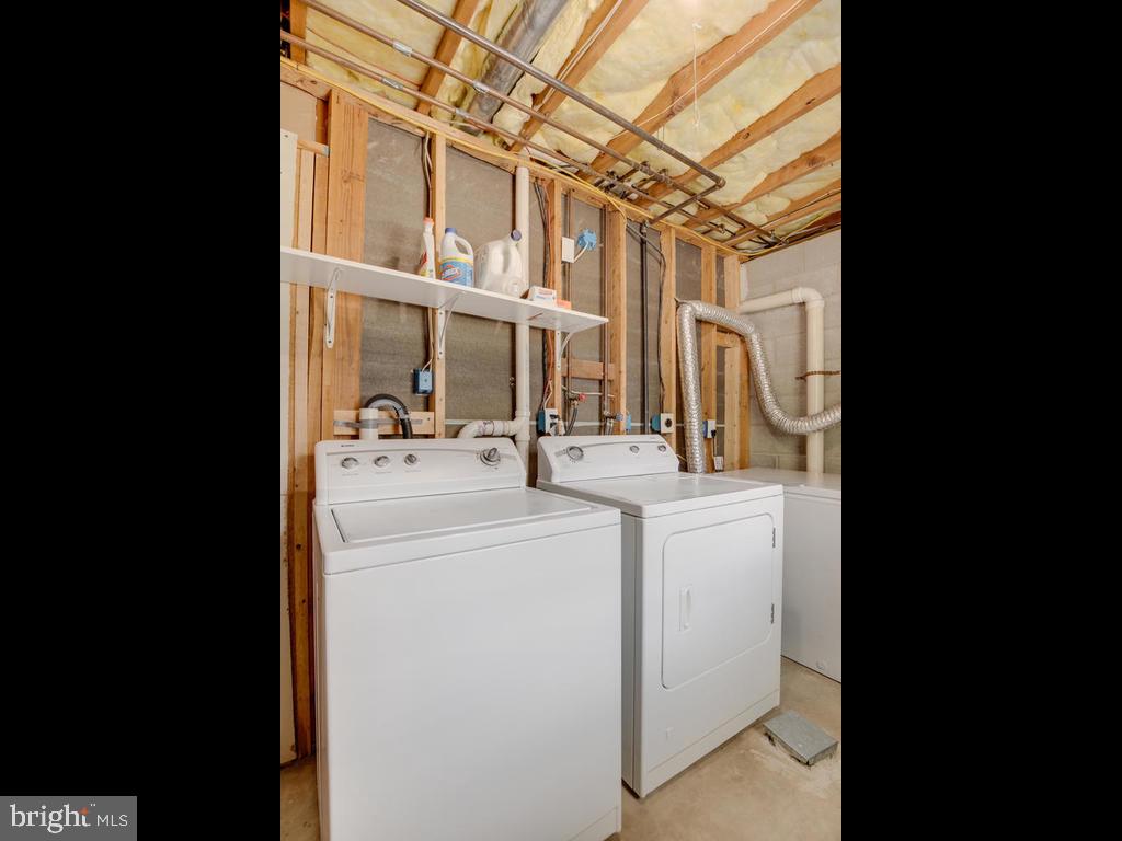 976 Pebblestone Road Pasadena, MD 21122 - Photo 30 of 39 Laundry room with washer, dryer & freezer