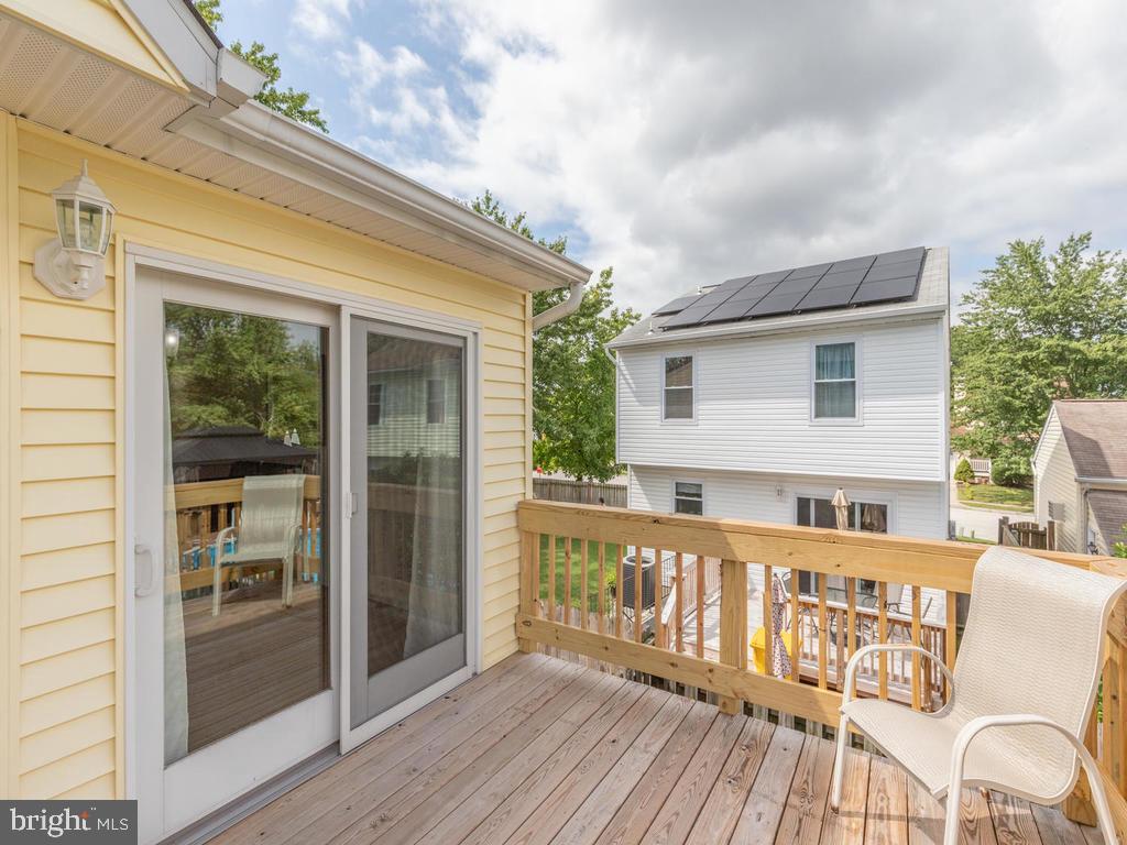 976 Pebblestone Road Pasadena, MD 21122 - Photo 31 of 39 Enjoy the sun on the deck