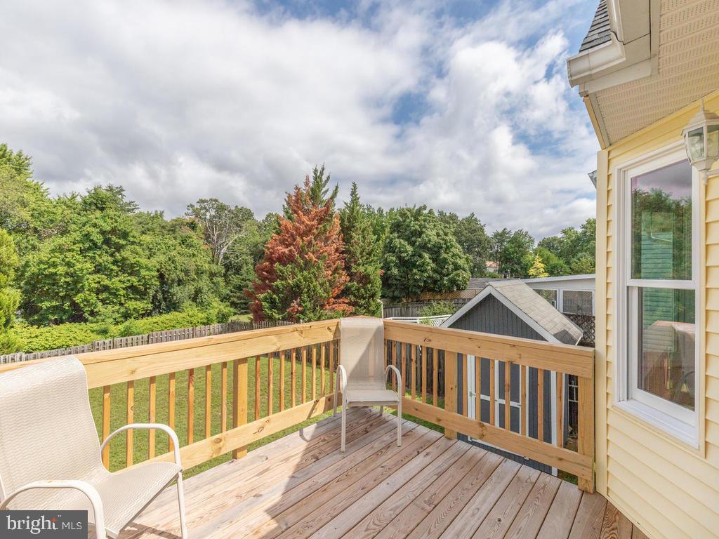 976 Pebblestone Road Pasadena, MD 21122 - Photo 32 of 39 Slide out from the dining room to the deck