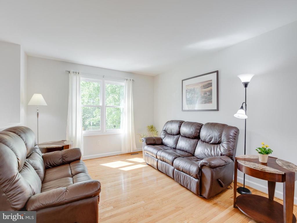 976 Pebblestone Road Pasadena, MD 21122 - Photo 5 of 39 Spacious living room with lots of natural light