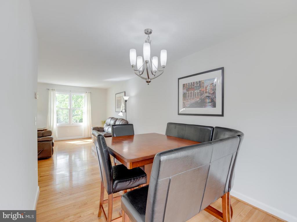 976 Pebblestone Road Pasadena, MD 21122 - Photo 8 of 39 Stylish brushed nickel chandelier in dining room