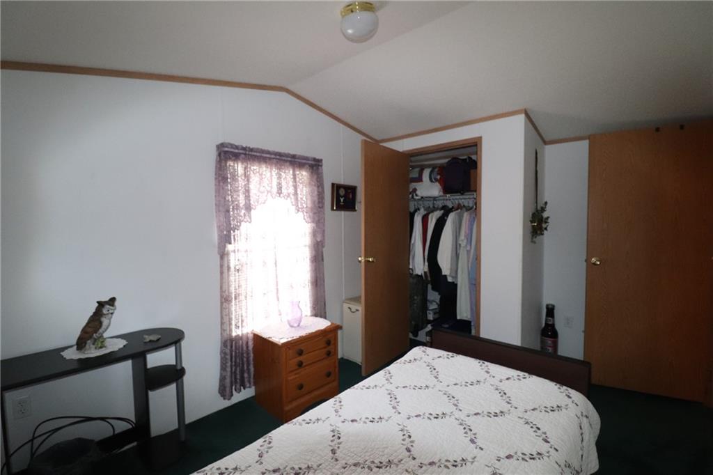 196 Tanner Street Export, PA 15632 - Photo 15 of 23 a bedroom with a bed and a dresser