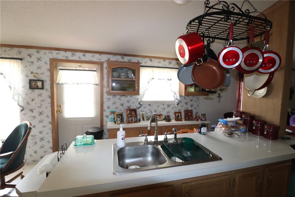 196 Tanner Street Export, PA 15632 - Photo 20 of 23 a kitchen with a sink and a stove