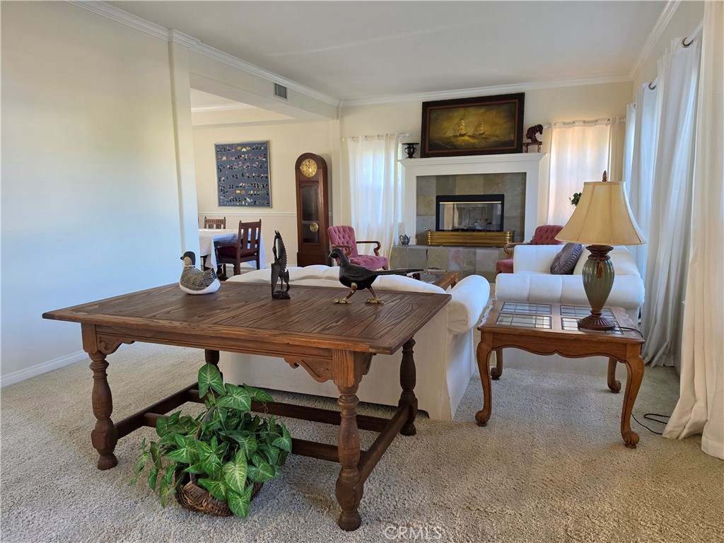 11541 Donovan Road Rossmoor, CA 90720 - Photo 23 of 113 Formal living room leads to the formal dining room