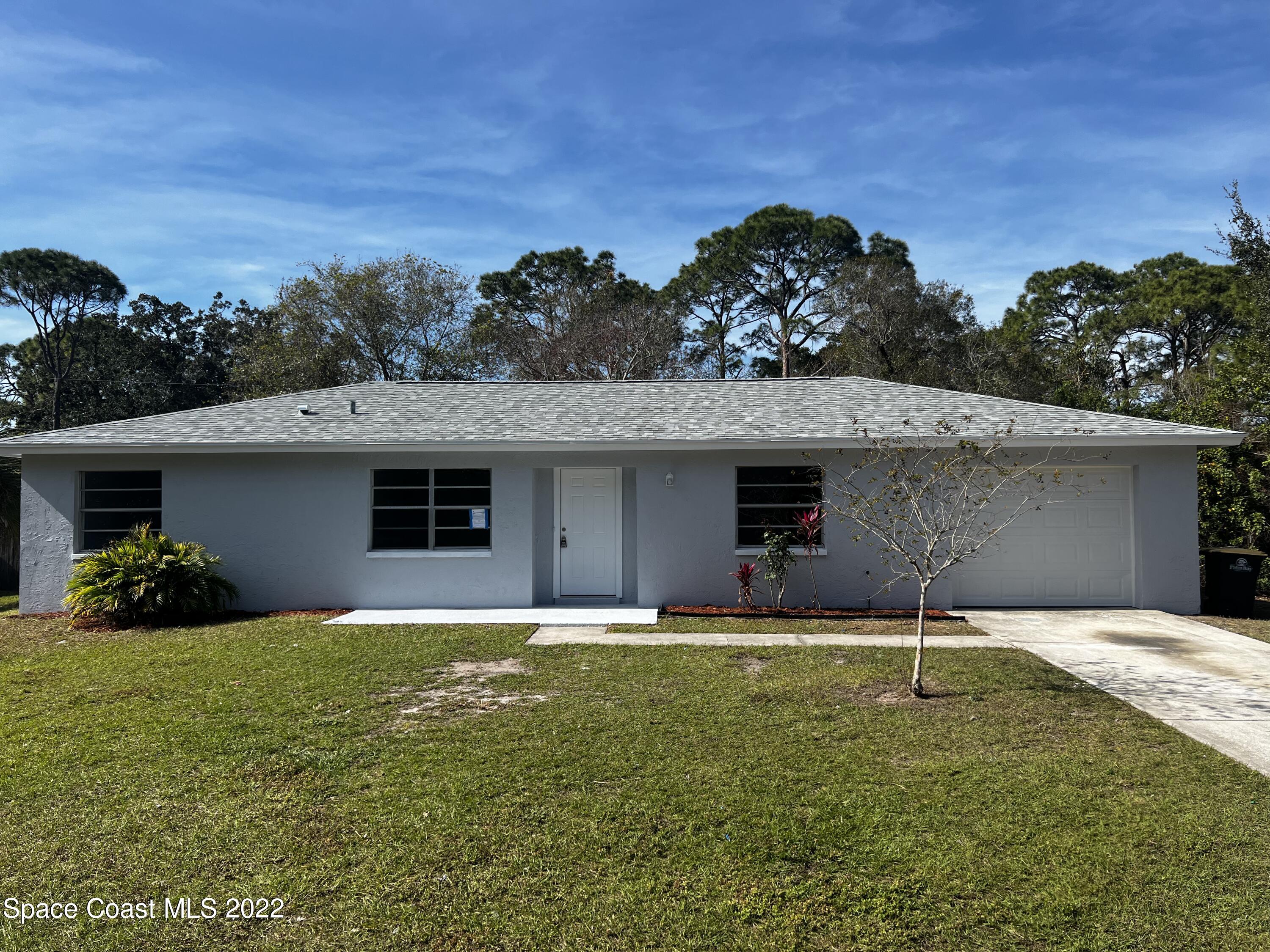 1258 Randy Avenue Southeast Palm Bay, FL 32909 - Photo 1 of 11 Front