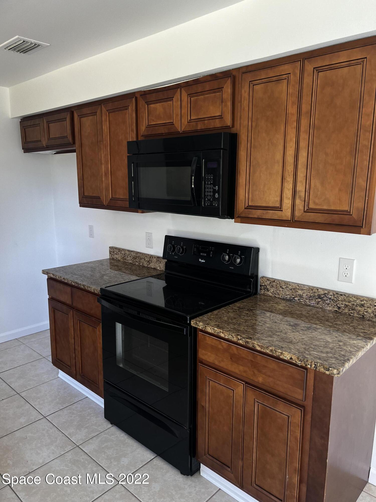 1258 Randy Avenue Southeast Palm Bay, FL 32909 - Photo 2 of 11 Kitchen