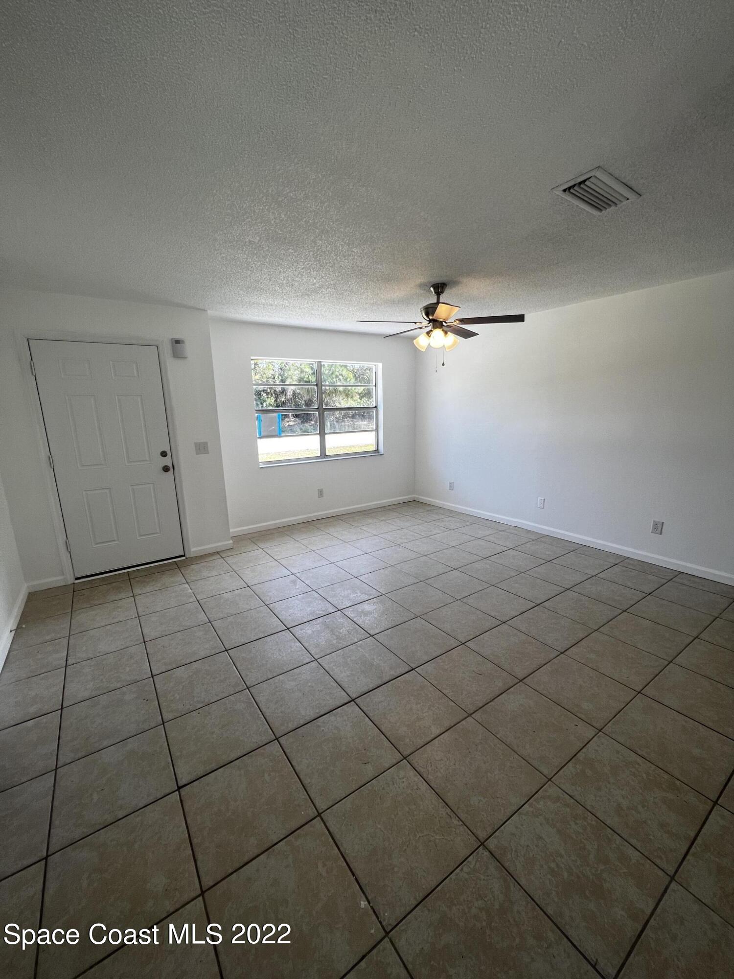1258 Randy Avenue Southeast Palm Bay, FL 32909 - Photo 4 of 11 Living
