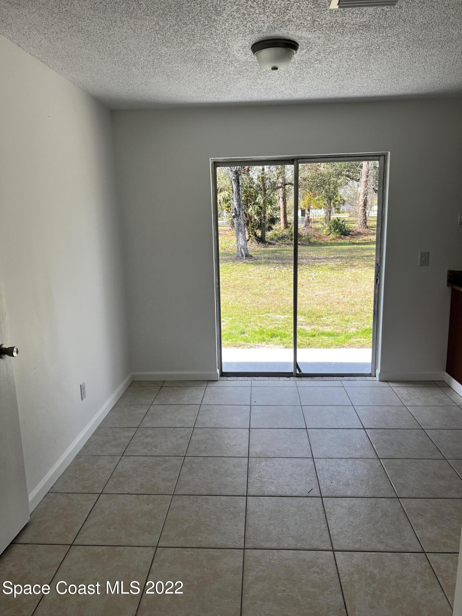 1258 Randy Avenue Southeast Palm Bay, FL 32909 - Photo 5 of 11 Dining
