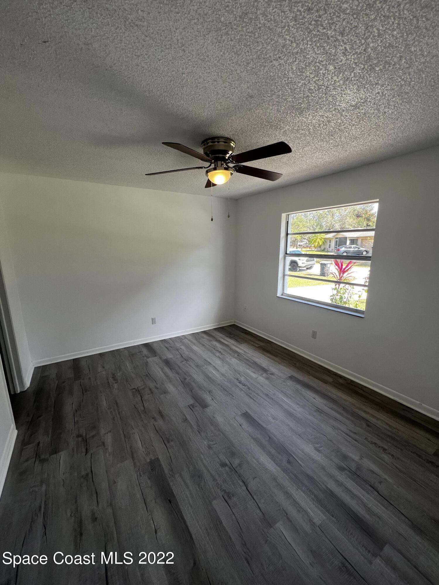 1258 Randy Avenue Southeast Palm Bay, FL 32909 - Photo 6 of 11 Master Bedroom