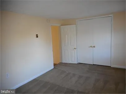 a kitchen with a sink and a window