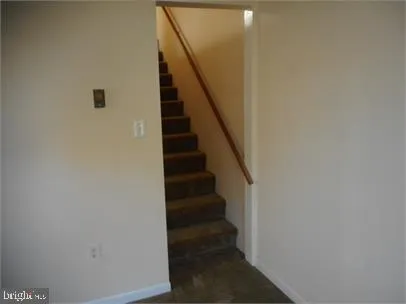 a view of a house with a white door