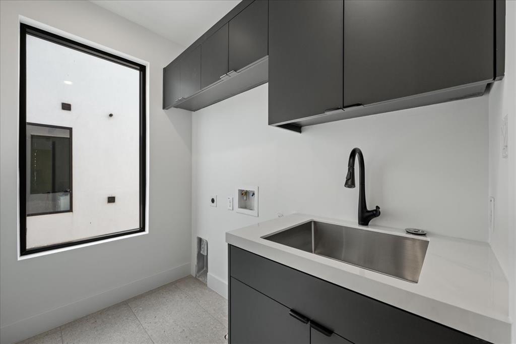 4519 Weldon Street Dallas, TX 75204 - Photo 20 of 40 a close view of a sink and tap