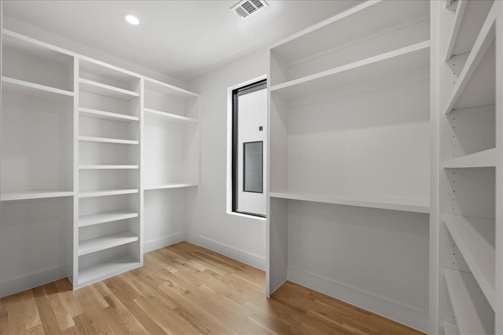 4519 Weldon Street Dallas, TX 75204 - Photo 30 of 40 a view of an empty room with empty racks
