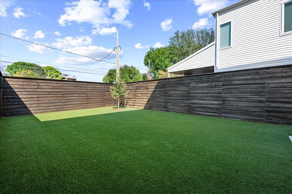 4519 Weldon Street Dallas, TX 75204 - Photo 39 of 40 a view of a backyard with a garden