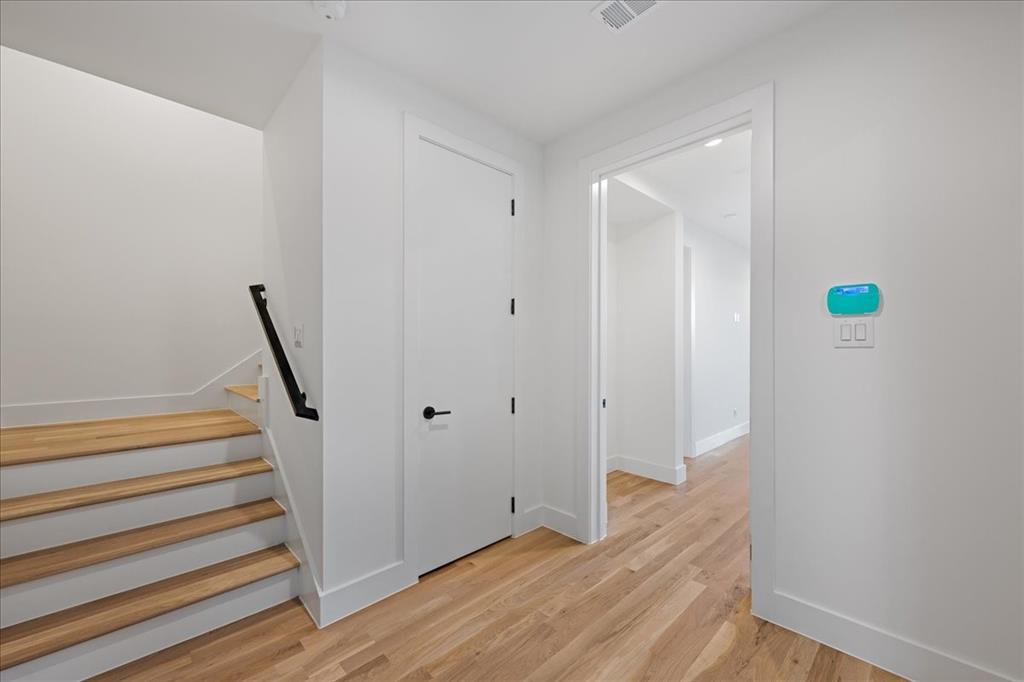 4519 Weldon Street Dallas, TX 75204 - Photo 8 of 40 a view of an entryway with wooden floor