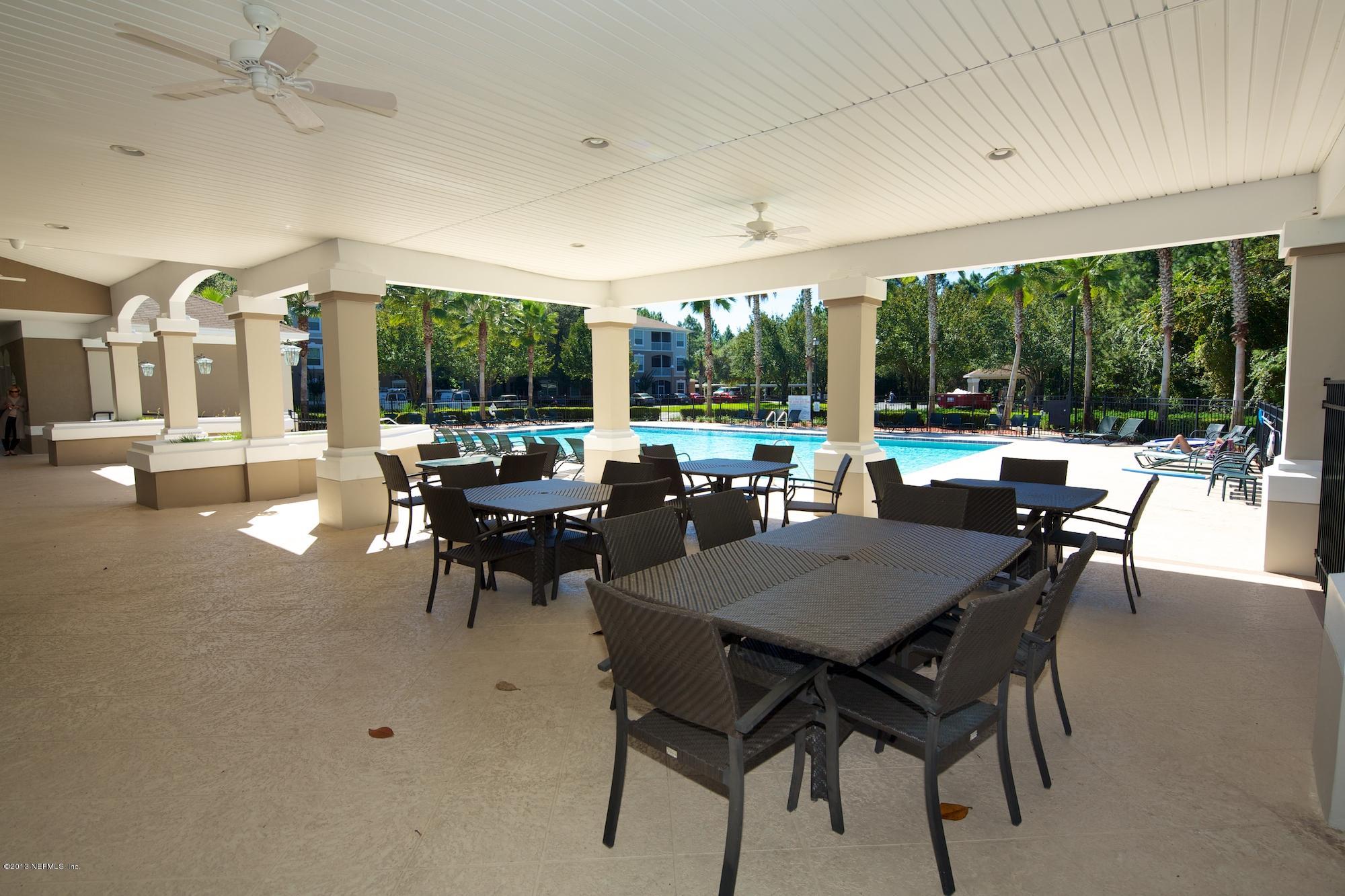 10550 Baymeadows Road, Unit 826 Jacksonville, FL 32256 - Photo 20 of 25 Covered Lanai Overlooking Community Pool