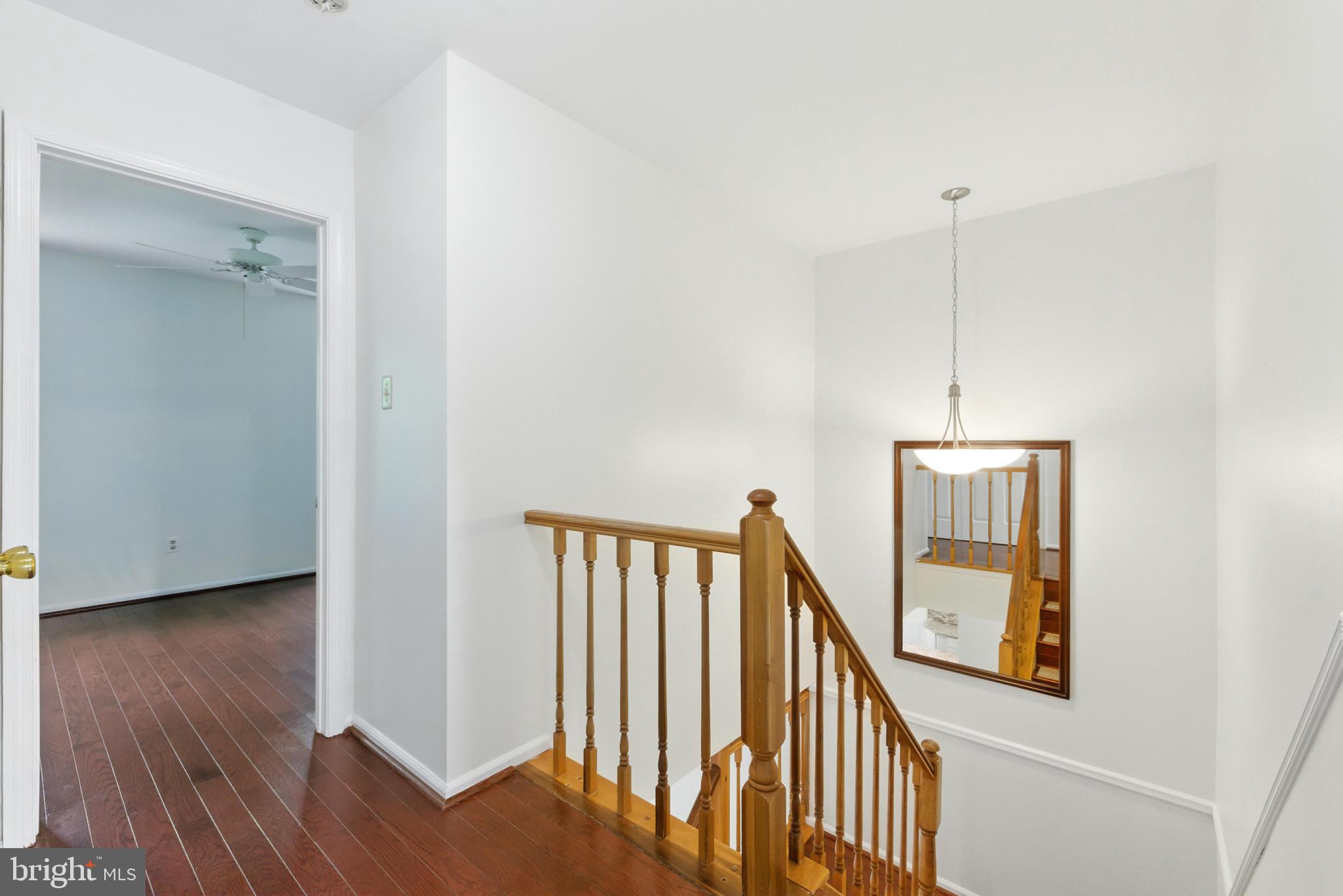 72 Carousel Circle Doylestown, PA 18901 - Photo 13 of 22 a view of staircase with railing and white walls