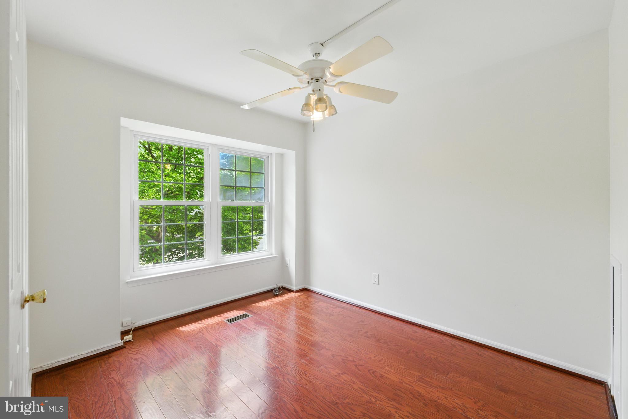 72 Carousel Circle Doylestown, PA 18901 - Photo 17 of 22 an empty room with a window and a fan