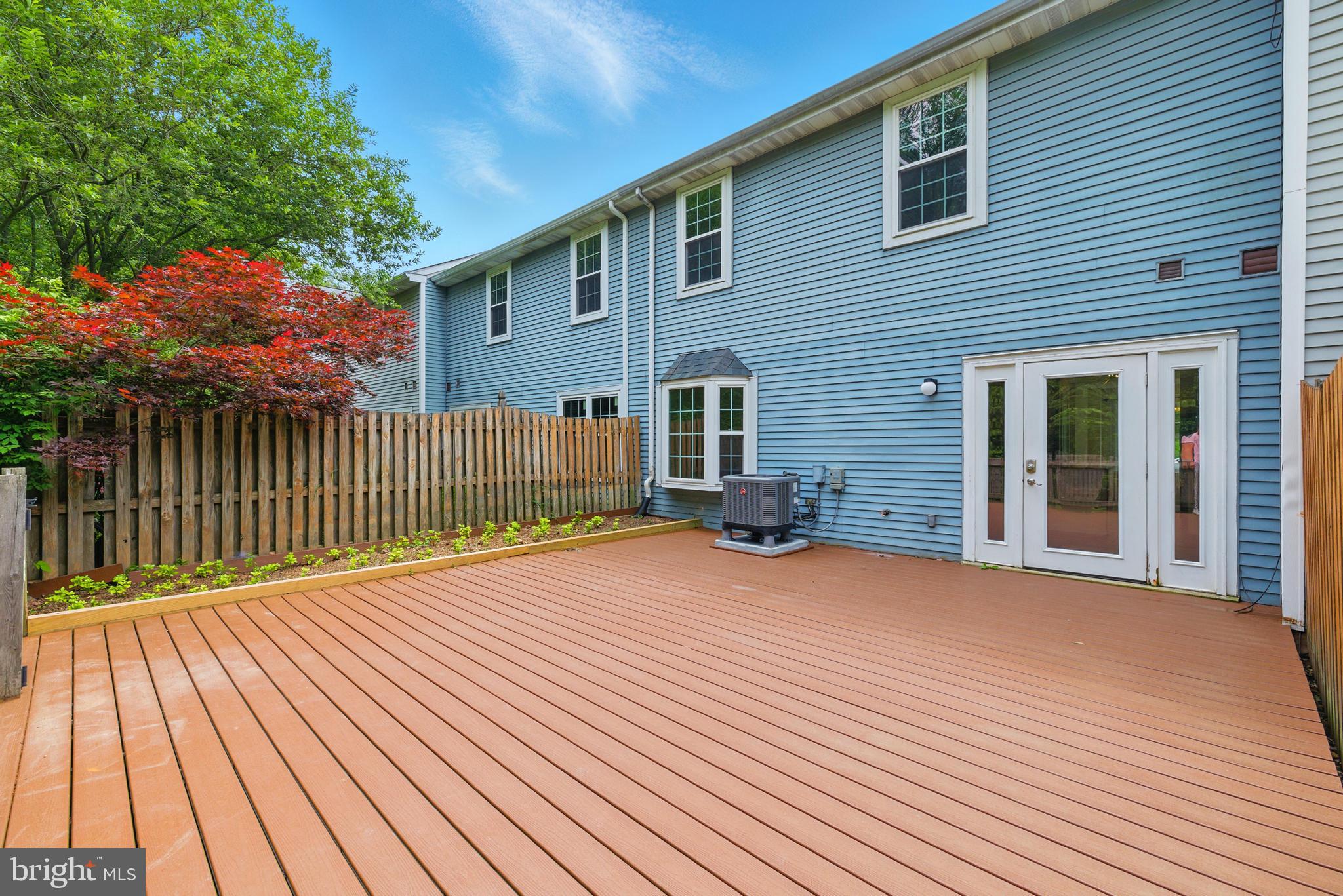 72 Carousel Circle Doylestown, PA 18901 - Photo 20 of 22 a view of backyard with deck and wooden floor