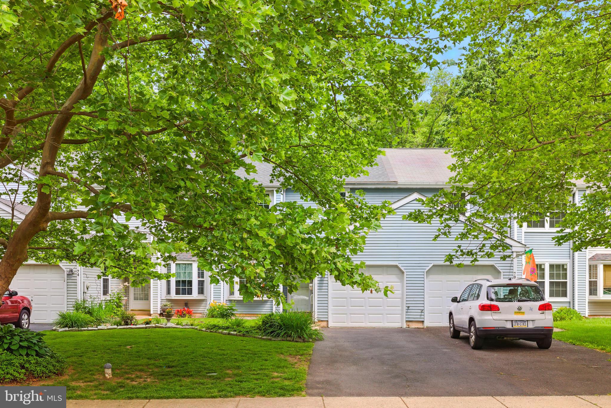 72 Carousel Circle Doylestown, PA 18901 - Photo 3 of 22 a car parked in front of white house