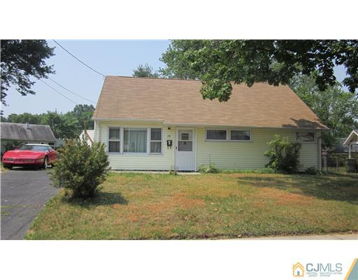 28 Richmond Road Edison, NJ 08817 - Photo 1 of 10 a house view with a garden space