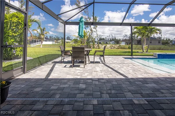a view of a park with sitting area