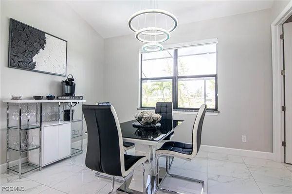 a work room with furniture and windows