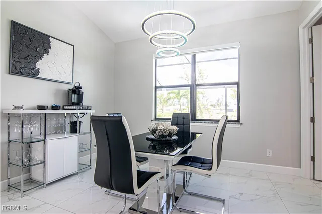 a work room with furniture and windows