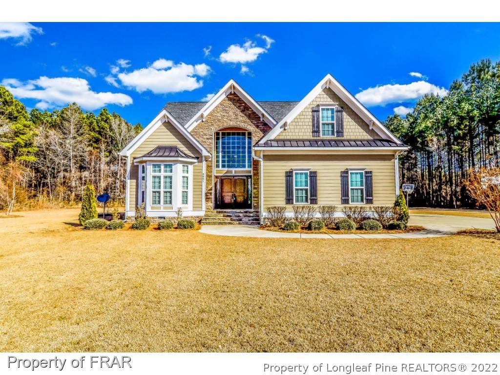 5491 Murphy Road Stedman, NC 28391 - Photo 1 of 33 a view of a house with swimming pool and porch