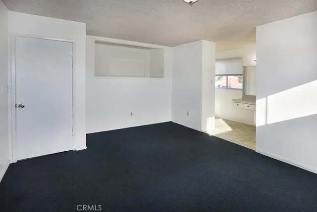 a bathroom with a bathtub shower sink vanity and toilet