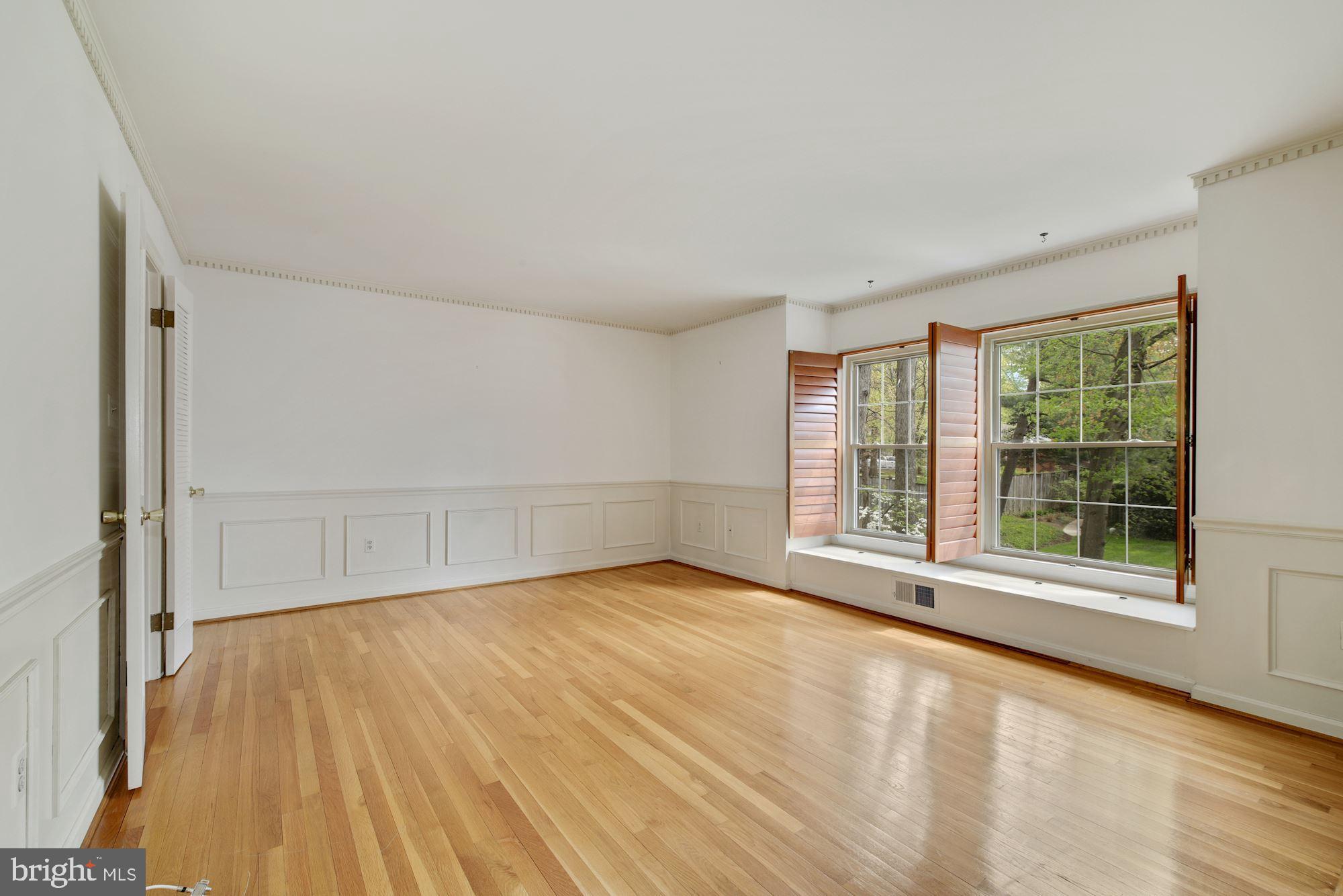 2123 Bucknell Terrace, Unit 52 Silver Spring, MD 20902 - Photo 6 of 26 Living Room w/ Built-Ins & Fireplace - Main Level
