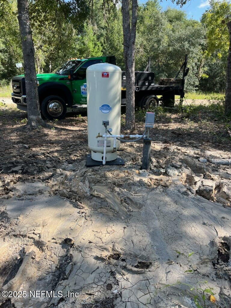 333 2nd Way Interlachen, FL 32148 - Photo 3 of 13 a view of a entrance gate of the house