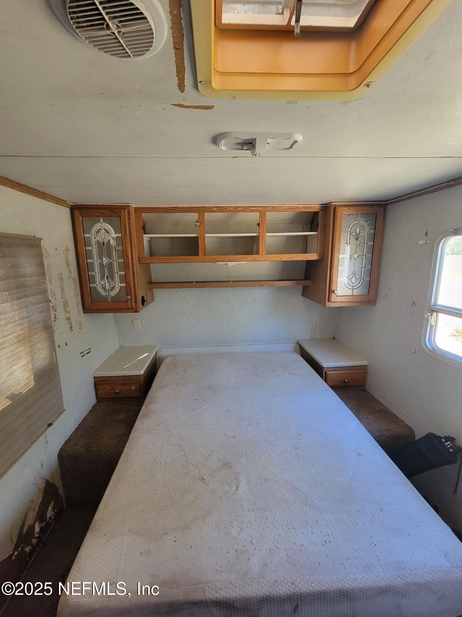 333 2nd Way Interlachen, FL 32148 - Photo 9 of 13 a view of a hallway with windows