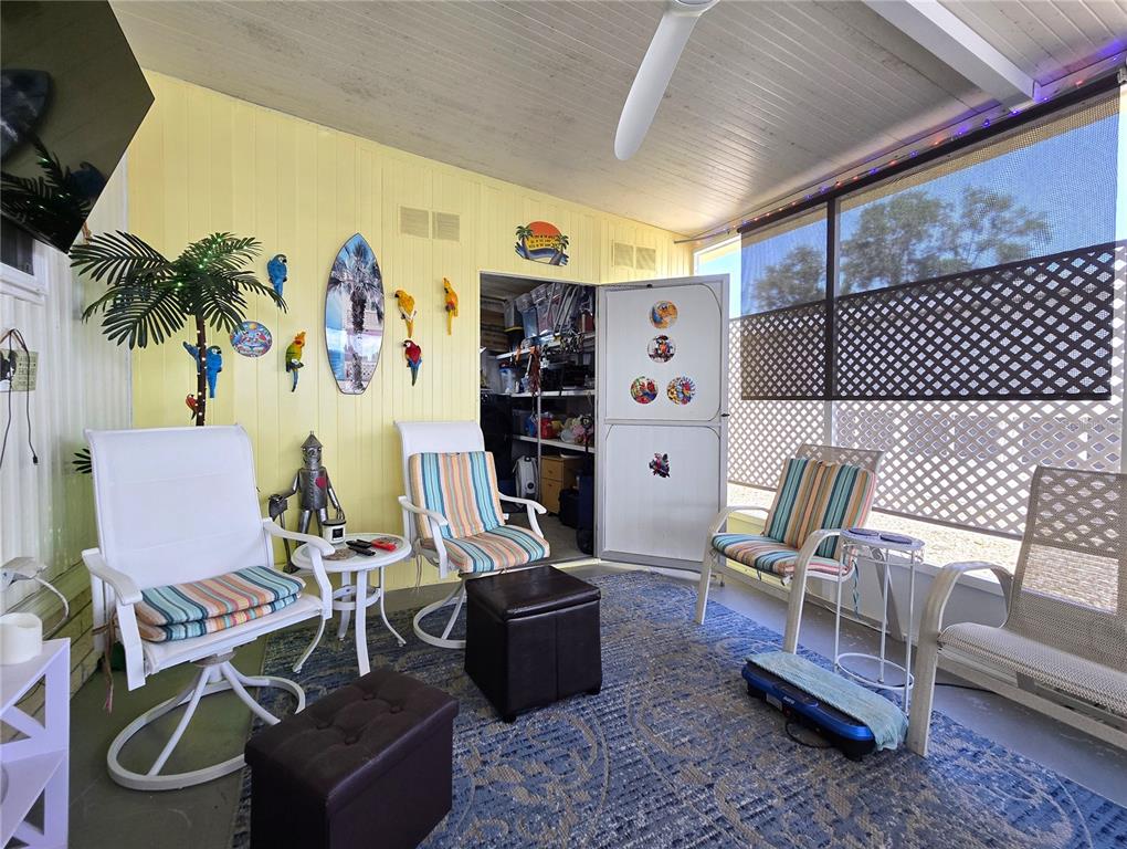 5619 Bayshore Road, Unit 435 Palmetto, FL 34221 - Photo 33 of 56 a view of a livingroom with furniture and potted plants
