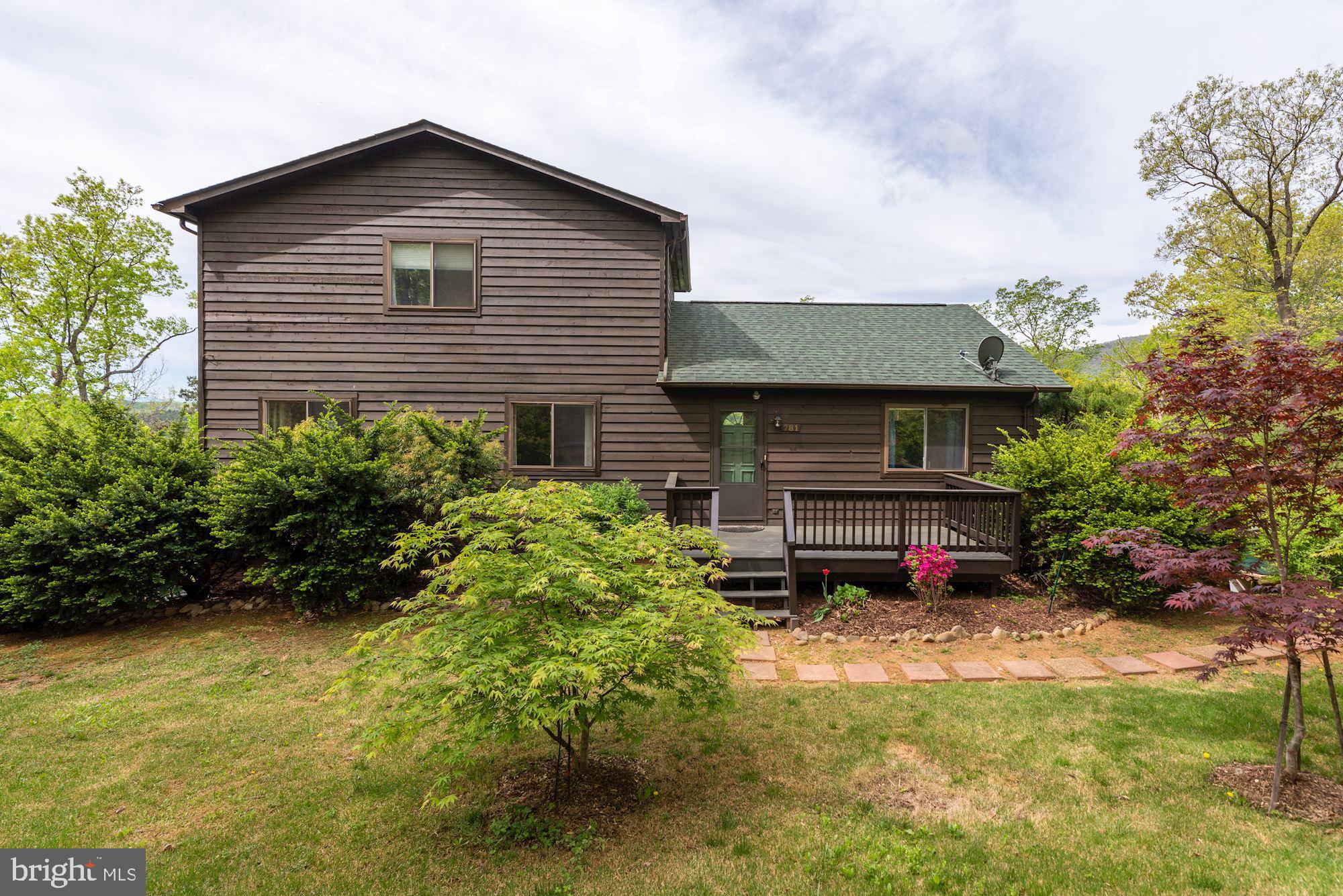 781 River Vw Road Rileyville, VA 22650 - Photo 2 of 16 a front view of a house with garden