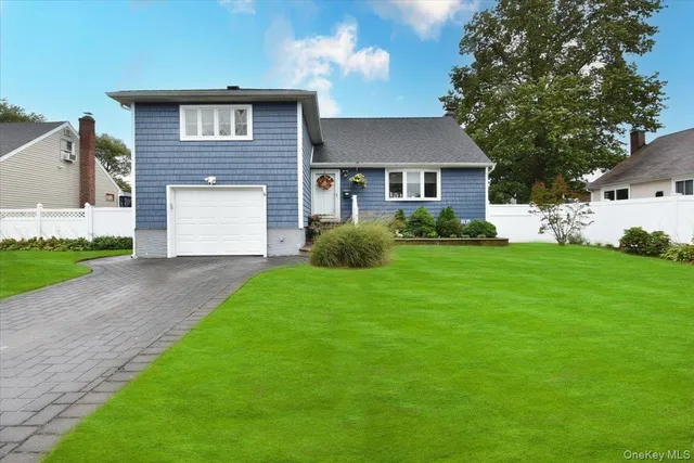 a brick house with a yard