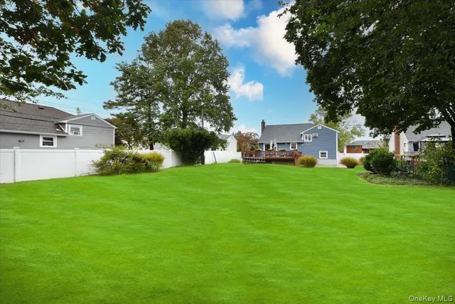 a view of a house with a back yard